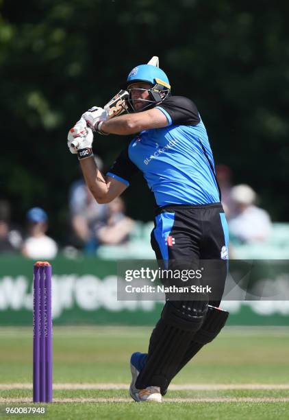 Ross Whiteley of Worcestershire raises bat after scoring 50 runs during the Royal London One-Day Cup match between Worcestershire and Derbyshire at...