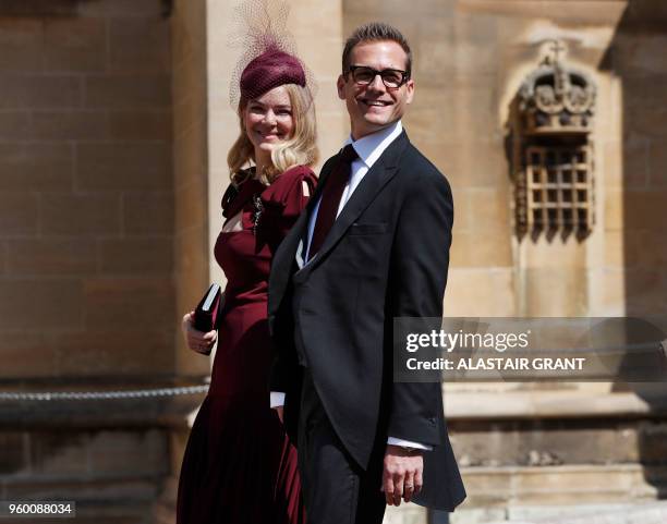 Actor Gabriel Macht and his wife Jacinda Barrett arrive for the wedding ceremony of Britain's Prince Harry, Duke of Sussex and US actress Meghan...