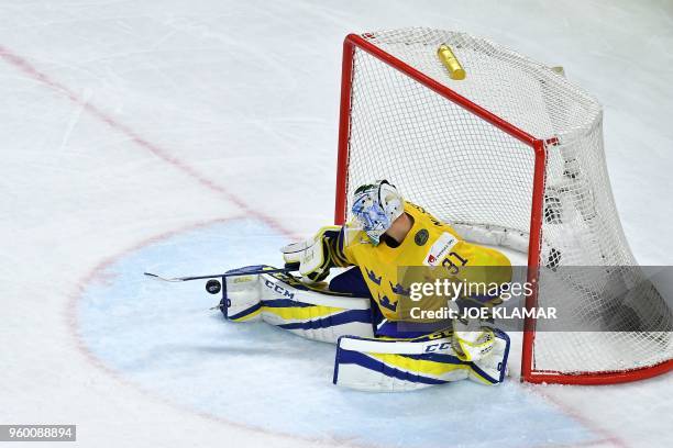 Sweden's goalie Anders Nilsson stops a puck during the semifinal match Sweden vs USA of the 2018 IIHF Ice Hockey World Championship at the Royal...