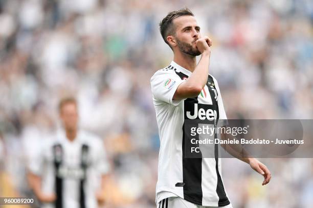 Miralem Pjanic of Juventus celebrates his goal of 2-0 during the serie A match between Juventus and Hellas Verona FC at Allianz Stadium on May 19,...