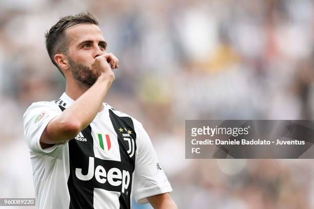 Miralem Pjanic of Juventus celebrates his goal of 2-0 during the serie A match between Juventus and Hellas Verona FC at Allianz Stadium on May 19,...