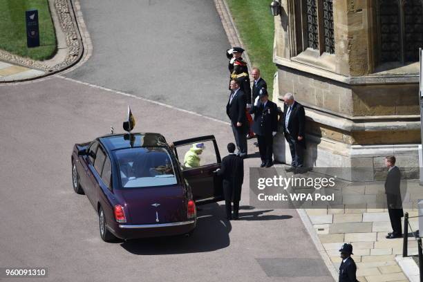 Britain's Queen Elizabeth II and Prince Philip, Duke of Edinburgh arrives at St George's Chapel at Windsor Castle before the wedding of Prince Harry...