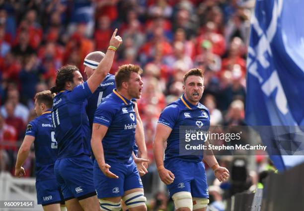 Dublin , Ireland - 19 May 2018; Jack Conan, right, celebrates with his Leinster team-mates James Lowe and Jordi Murphy after scoring the opening try...