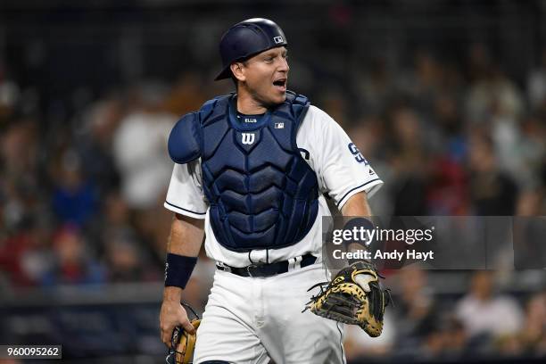 Ellis of the San Diego Padres talks as he leaves the field during the game against the Washington Nationals at PETCO Park on May 9, 2018 in San...