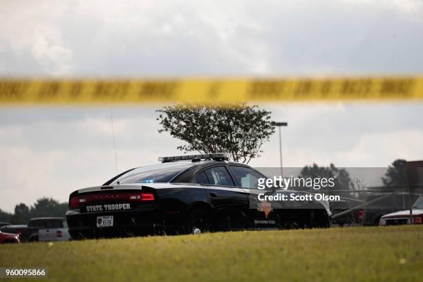 Police stand guard outside of Santa Fe High School on May 19, 2018 in Santa Fe, Texas. Yesterday morning 17-year-old student Dimitrios Pagourtzis...