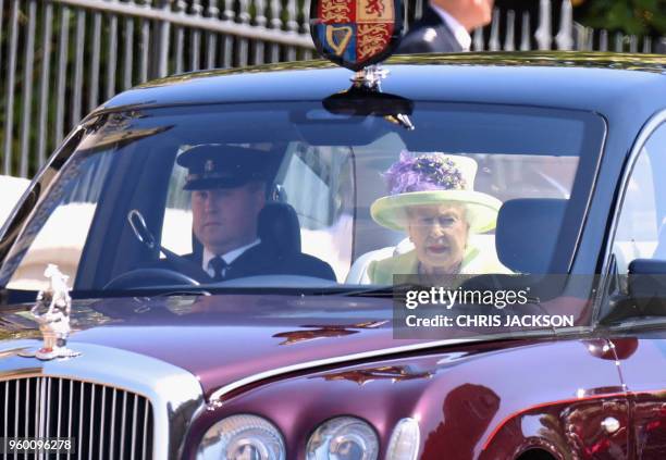 Britain's Queen Elizabeth II arrives for the wedding ceremony of Britain's Prince Harry, Duke of Sussex and US actress Meghan Markle at St George's...