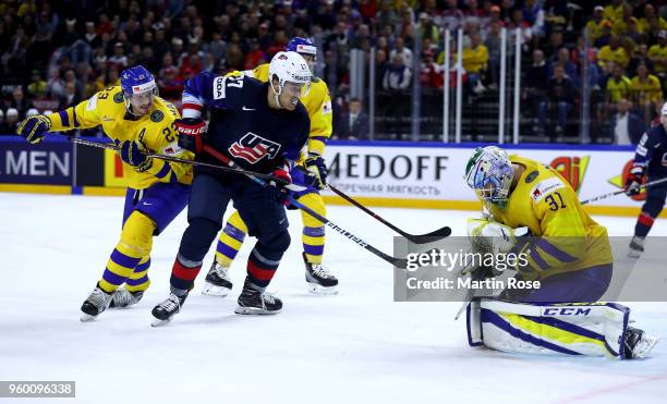 Oliver Ekman Larsson of Sweden and Anders Lee of the United States battle for position during the 2018 IIHF Ice Hockey World Championship Semi Final...