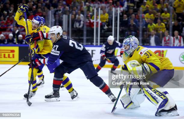 Oliver Ekman Larsson of Sweden and Anders Lee of the United States battle for position during the 2018 IIHF Ice Hockey World Championship Semi Final...