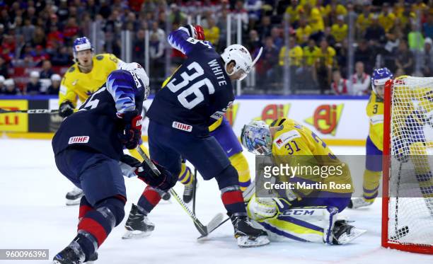 Colin White of the United States fails to score a goal over Anders Nilsson, goaltender of Sweden during the 2018 IIHF Ice Hockey World Championship...
