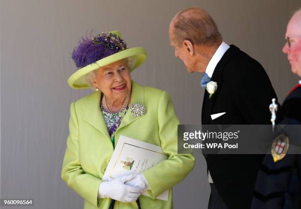 Queen Elizabeth II talks with Prince Philip, Duke of Edinburgh after the wedding of Prince Harry and Meghan Markle at St George's Chapel at Windsor...