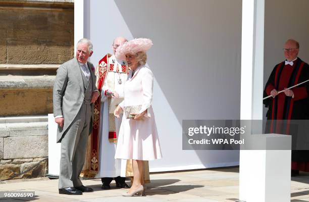 Prince Charles, Prince of Wales and Camilla, Duchess of Cornwall wait for the bride to arrive at St George's Chapel at Windsor Castle for the wedding...