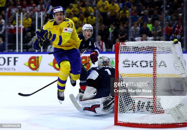 Oliver Ekman Larsson of Sweden fails to score over Keith Kinkaid, goaltender of the United States during the 2018 IIHF Ice Hockey World Championship...