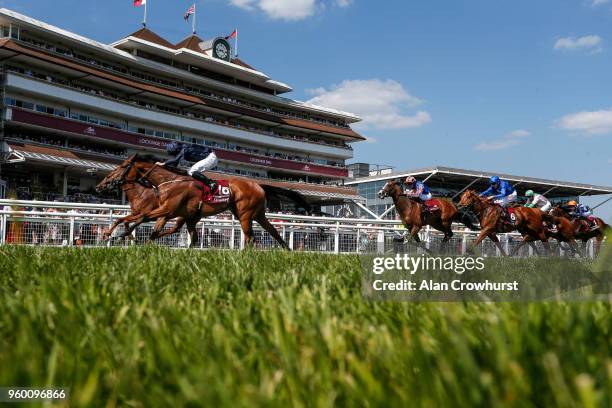 Ryan Moore riding Rhododendron win The Al Shaqab Lockinge Stakes from Lightning Spear at Newbury Racecourse on May 19, 2018 in Newbury, United...