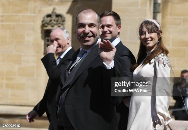 Actor Rick Hoffman waves as he arrives at St George's Chapel at Windsor Castle for the wedding of Prince Harry and Meghan Markle on May 19, 2018 in...
