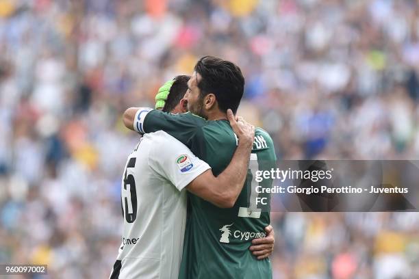 Gianluigi Buffon of Juventus hugs his teammate Andrea Barzagli during the serie A match between Juventus and Hellas Verona FC at Allianz Stadium on...