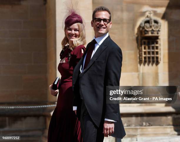 Actor Gabriel Macht and his wife Jacinda Barrett arrive for the wedding ceremony of Prince Harry and Meghan Markle at St. George's Chapel in Windsor...