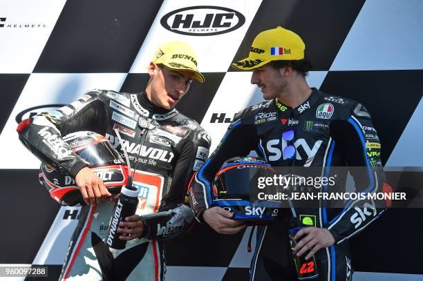 Second placed Kalex Dynavolt Intact GP Spanish's rider Xavier Vierge and Kalex Sky Racing Team VR46 Italian's rider Francesco Bagnaia celebrate on...