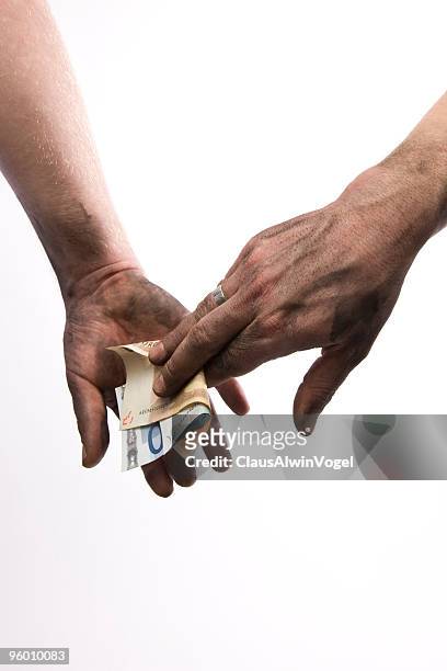dirty hands taking money - geld stock pictures, royalty-free photos & images