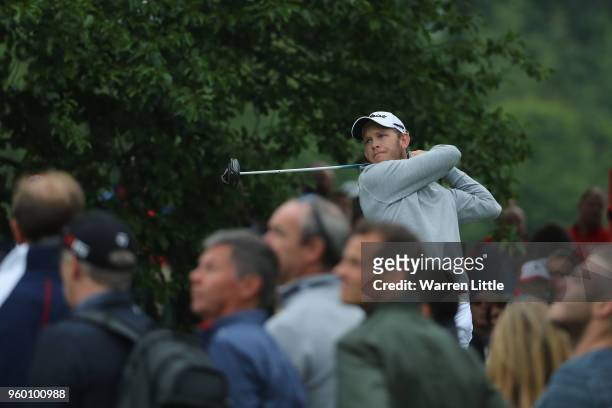 Chris Hanson of England plays his shot on the 16th tee during the knockout stage on day three of the Belgian Knockout at Rinkven International Golf...