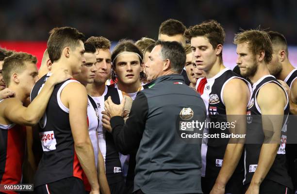 Alan Richardson, coach of the Saints speaks to his team during a quarter time break during the round nine AFL match between the St Kilda Saints and...