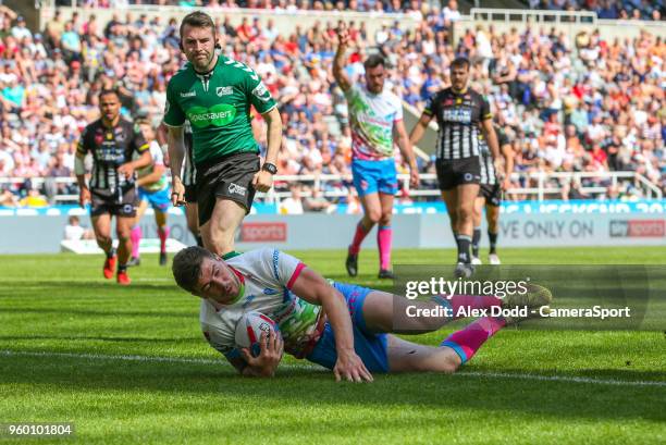 St Helens' Mark Percival scores his side's second try during the Betfred Super League Round 15 match between Widnes Vikings and St Helens at St...