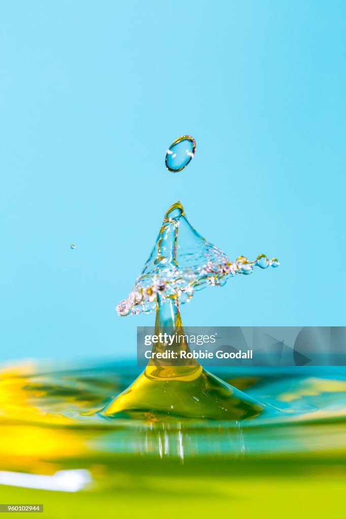 Water Drip On a blue backdrop