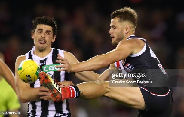 Scott Pendlebury of the Magpies and Maverick Weller of the Saints compete for the ball during the round nine AFL match between the St Kilda Saints...