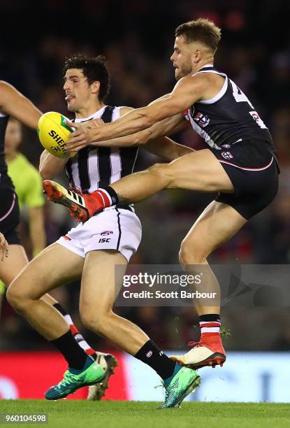 Scott Pendlebury of the Magpies and Maverick Weller of the Saints compete for the ball during the round nine AFL match between the St Kilda Saints...