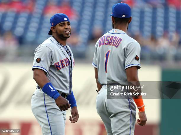 Amed Rosario and Yoenis Cespedes of the New York Mets warmup before a game against the Philadelphia Phillies at Citizens Bank Park on May 11, 2018 in...