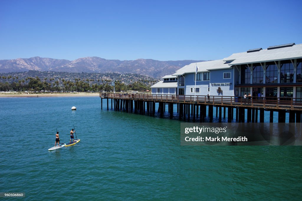Santa Barbara Pier and paddle boarders