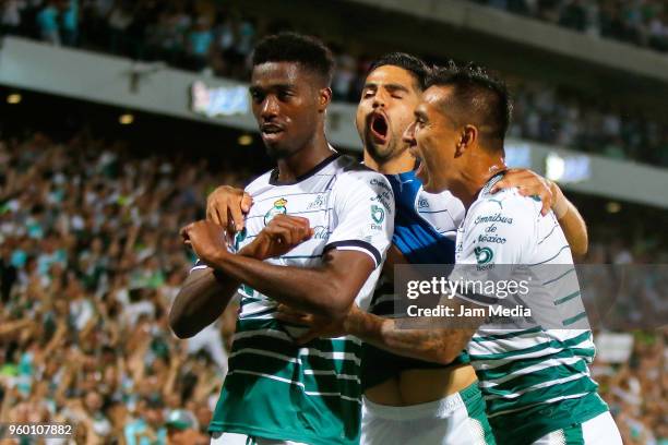 Tavares of Santos celebrates with teammates after scoring the first goal of his team during the Final first leg match between Santos Laguna and...