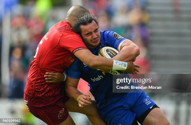 Dublin , Ireland - 19 May 2018; James Lowe of Leinster is tackled by Simon Zebo of Munster during the Guinness PRO14 semi-final match between...