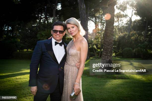 Anton Borisevich and Victoria Borisevich pose for portraits at the amfAR Gala Cannes 2018 cocktail at Hotel du Cap-Eden-Roc on May 17, 2018 in Cap...