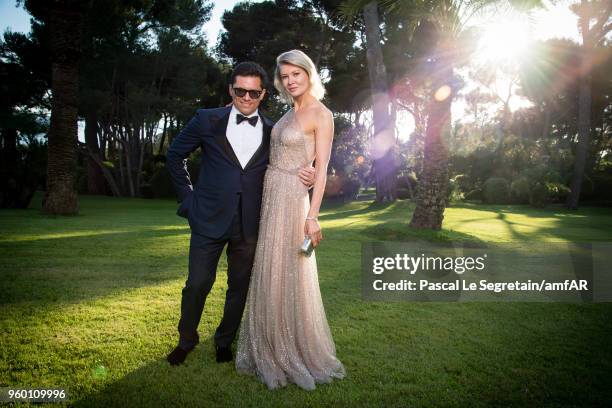 Anton Borisevich and Victoria Borisevich pose for portraits at the amfAR Gala Cannes 2018 cocktail at Hotel du Cap-Eden-Roc on May 17, 2018 in Cap...