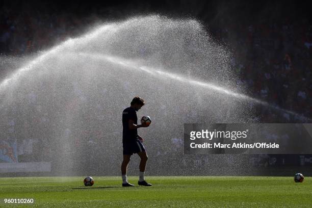 Marcos Alonso of Chelsea looks on before kick off as the pitch is watered during The Emirates FA Cup Final between Chelsea and Manchester United at...