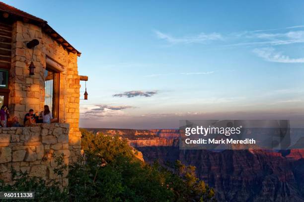 people enjoy the spectacular views from grand canyon lodge on the north rim - grand canyon stock-fotos und bilder