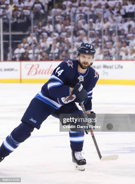 Josh Morrissey of the Winnipeg Jets keeps an eye on the play during first period action against the Vegas Golden Knights in Game Two of the Western...