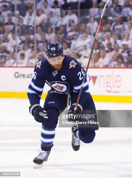 Blake Wheeler of the Winnipeg Jets follows the play down the ice during first period action against the Vegas Golden Knights in Game Two of the...