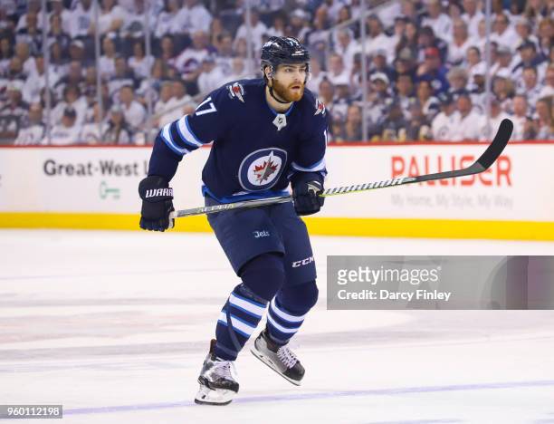 Adam Lowry of the Winnipeg Jets follows the play down the ice during first period action against the Vegas Golden Knights in Game Two of the Western...