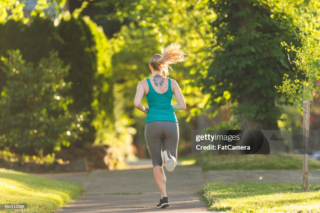 Solo Female Runner on a Beautiful Morning Jog