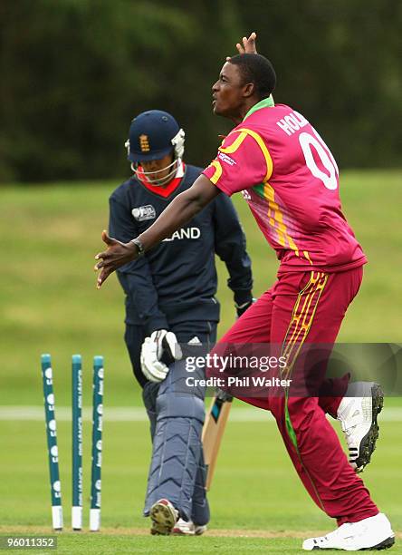 Jason Holder of the West Indies celebrates bowling Azeem Rafiq of England during the ICC U19 Cricket World Cup Quarter Final One match between...