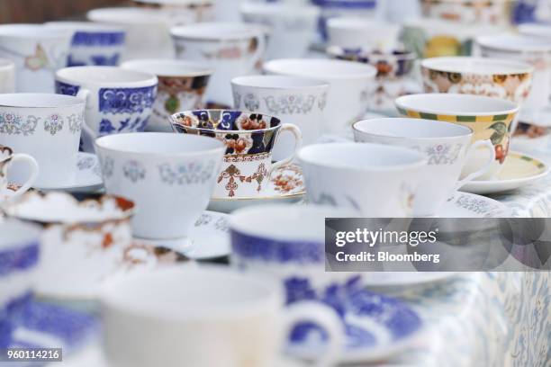 Decorative tea cups sit on a table during a street party to celebrate the wedding of Britain's Prince Harry to Meghan Markle, who will become the...