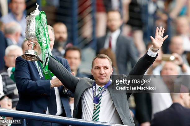 Brendan Rodgers, manager of Celtic holds the Scottish Cup Trophy following the Scottish Cup Final between Motherwell and Celtic at Hampden Park on...