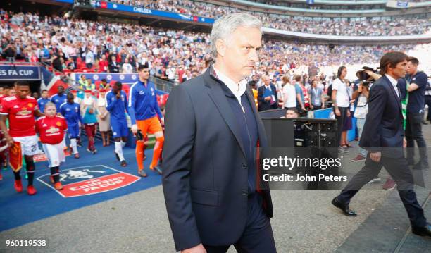 Manager Jose Mourinho of Manchester United and Manager Antonio Conte of Chelsea lead the teams out ahead of the Emirates FA Cup Final match between...