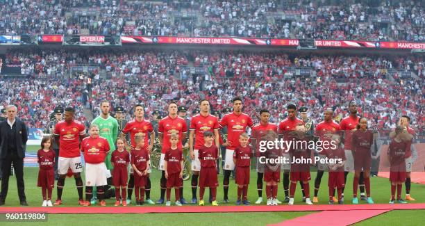 The Manchester United team lines up ahead of the Emirates FA Cup Final match between Manchester United and Chelsea at Wembley Stadium on May 19, 2018...