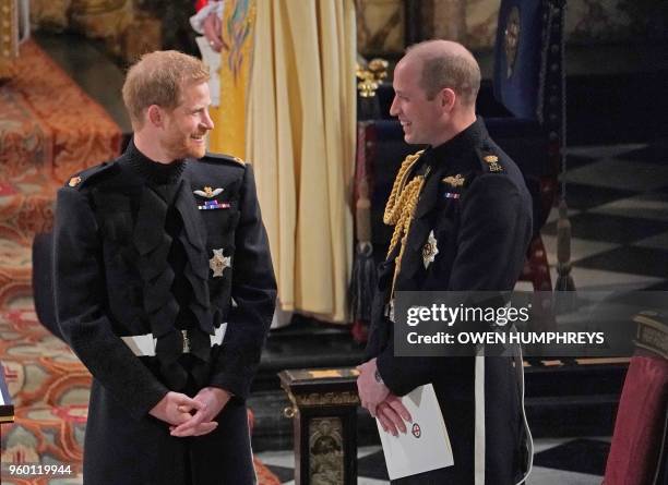 Britain's Prince Harry, Duke of Sussex and Prince Harry's brother and best man Prince William, Duke of Cambridge wait in the chapel ahead of his...