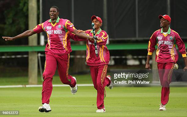 Jason Holder of the West Indies celebrates his wicket of David Payne of England to win the match during the ICC U19 Cricket World Cup Quarter Final...