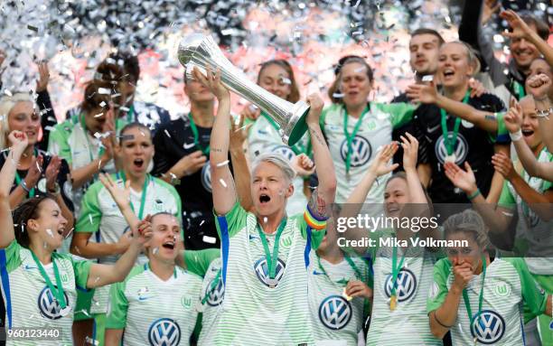 Nilla Fischer of Wolfsburg celebrates the winning of the trophy after the Women's DFB Cup Final between VFL Wolfsburg and FC Bayern Muenchen at...