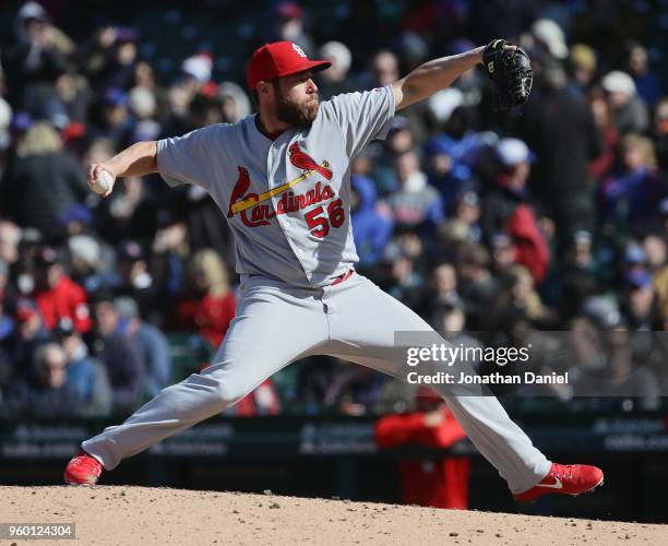 Greg Holland of the St. Louis Cardinals pitches against the Chicago Cubs at Wrigley Field on April 19, 2018 in Chicago, Illinois. The Cubs defeated...