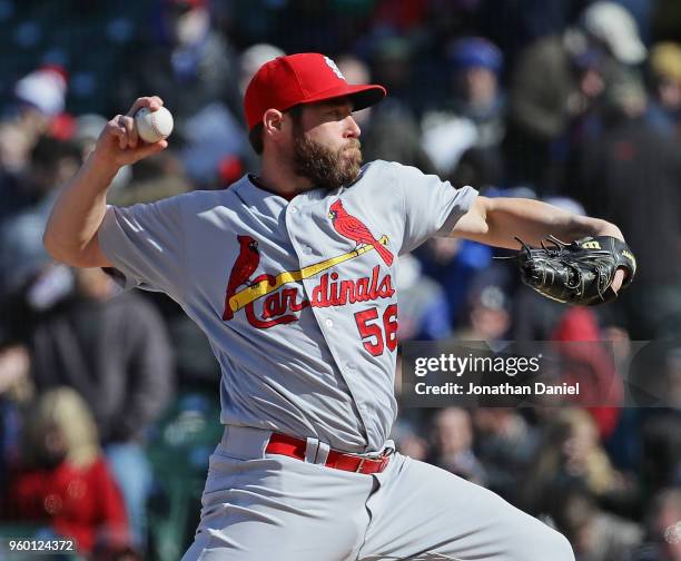 Greg Holland of the St. Louis Cardinals pitches against the Chicago Cubs at Wrigley Field on April 19, 2018 in Chicago, Illinois. The Cubs defeated...